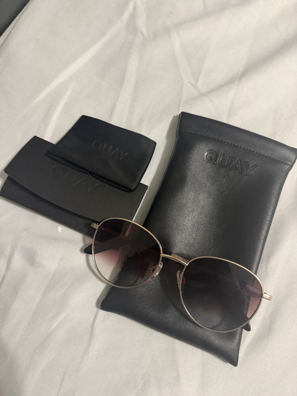 Quay Australia Round Metal Sunglasses in Black and Gold